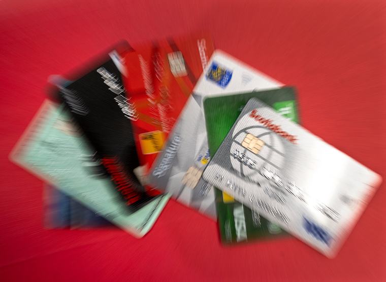 Major cash-back cards cut customer benefits