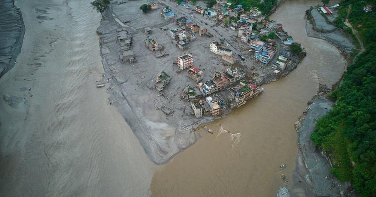 Rescuers pull 2 trapped workers from a hydropower tunnel 9 days after Nepal floods