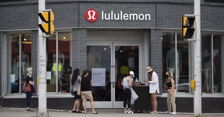 Lululemon shares plunge after profit drop, forecast downgrade