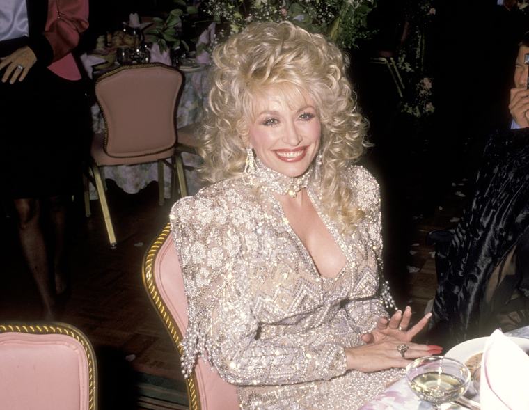 Dolly Parton: The meaning behind the songwriting icon’s ‘more-is-more’ style
