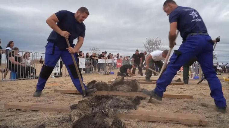 Competitors dig deep in Hungarian cemetery’s grave-digging contest