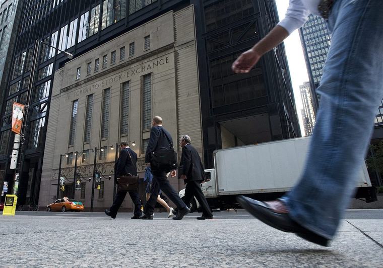 Stock markets slide amid the release of labour data in Canada and the U.S.