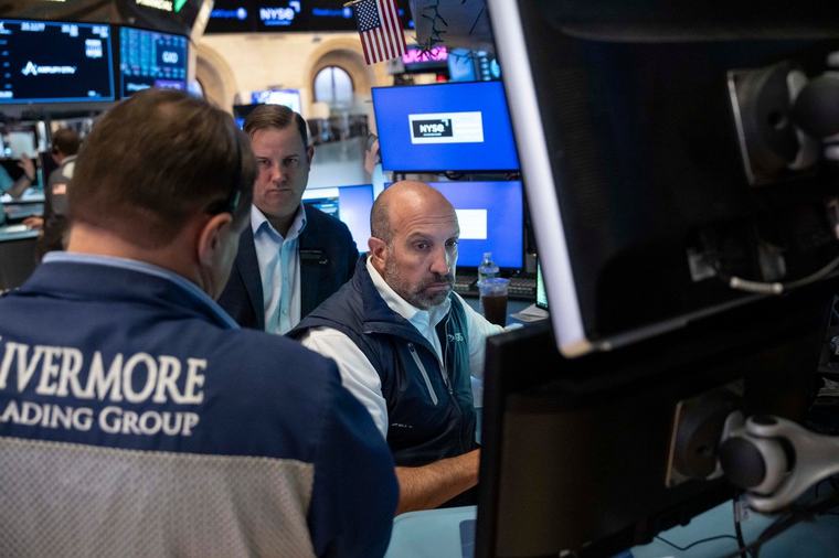 U.S. stocks fall after a surprisingly strong jobs report raises prospects of an interest rate hike